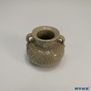 GB042 北宋當陽峪窯土黃釉絞胎回紋雙耳罐