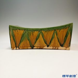 FB065 唐代晚期鞏義窯黃釉綠彩刻繪瑞獸紋瓷枕