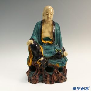 HB042 明代孔雀藍三彩陶瓷佛教羅漢坐像