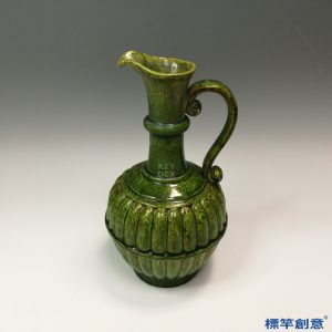 FB118 唐代鞏義窯綠釉絞胎刻瓜棱紋仿金銀壺執壺