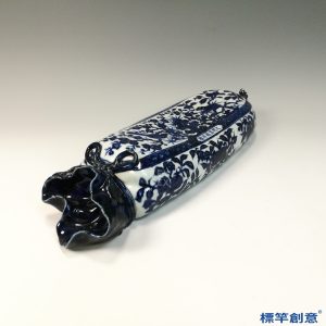 HB060 明代宣德景德鎮窯青花繪花鳥紋布袋形瓷枕